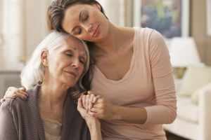 Portrait of tender mother daughter moment, assisted home care st. louis