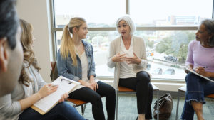 group discussing mental effects of caregiving