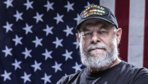 Vietnam Veteran in front of the American flag