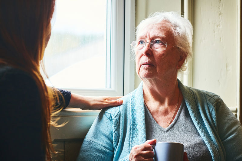 A woman talks with her mother about common senior care mistakes.